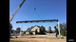 Installing an airplane hangar beam after we fabricated it