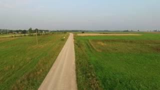 Flight Beyond Gravel Road In Countryside 2 - cutestockfootage.com