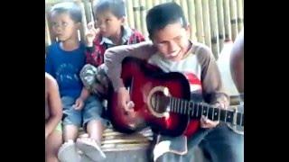 Remix moro songs.  Village boy with a nice voice.