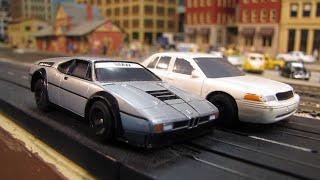 AFX Tomy Super Racing Turbo Slot Cars: Crown Vic & BMW and a DSS&A Ore Train