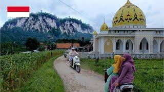 village life in indonesia, walking visiting the village under the mountain in rural Indonesia