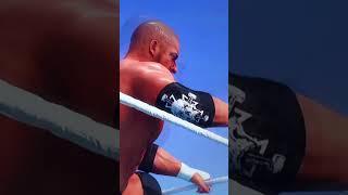 Triple H bleeding heavy holds his championship high WWE 2K24