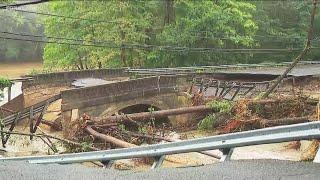 Connecticut residents clean up after heavy rain washes away roads, floods neighborhoods