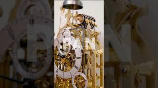 An English quarter chiming calendar skeleton clock in 'teaser' for the PAN fair Amsterdam, nov 2021