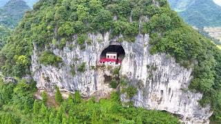 Guizhou woman lives in seclusion in cave for more than ten years