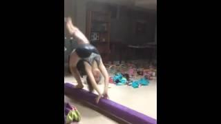 Back walkover on the beam Age 8