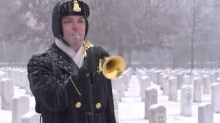 "Taps" performed by United States Army Band Bugler in Arlington National Cemetery in snow.