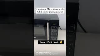 Compact Microwave with USB Ports and Allocator - Allows you to plug in fridge for safer operation.