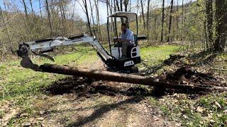 Chinese MINI EXCAVATOR gets a workout, ditches and culvert pipe Groundhog ZH12G