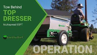 MultiSpread 65PT Spreading Action! Pull Behind Top Dress Spreader From Earth & Turf Products