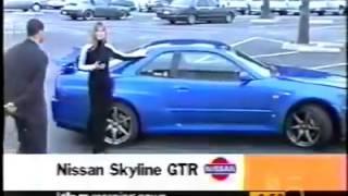 Female News Reporter Pretends to Know About Nissan R34 GTR