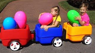 Diana and Roma playing with HUGE EGGS Surprise Toys