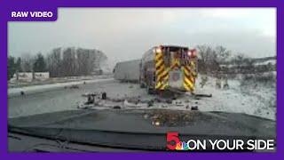 RAW VIDEO: Fire truck struck while at crash scene in Michigan