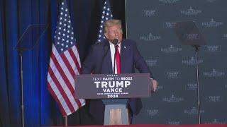 Former President Donald Trump speaks to voters in Concord