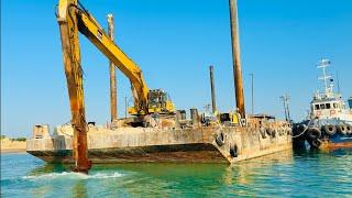 operator jobs and challenge  barge sifting by long arm excavator 1 mistake life finish 