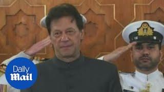 Cricket legend Imran Khan is sworn in as Pakistan's new prime minister