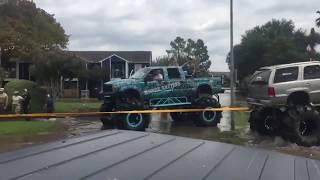 Rednecks In Houston TX Use Monster Truck To Pull A Military Truck From Deep Water