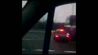 Lorry Pushes Car along motorway