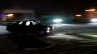 BMW E30 Drift in the snow on parking deck 320i Convertible