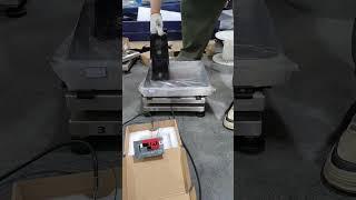Watch this 300×300mm Economical Platform Scale being calibrated to handle 200KG with ease!