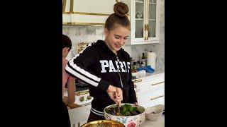 Karolina Protsenko is making breakfast for her family