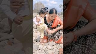 Gnani collecting stones in Pahalgam #shorts #trending #ytshorts #baby #viralvideo #telugu
