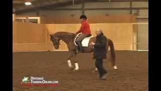 Christoff Hess teaching student on how to get the proper canter rhythm