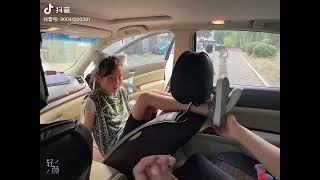 Chinese girl tickle feet on car