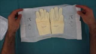 How to put on sterile gloves