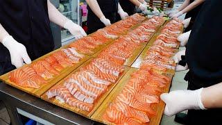 Amazing! Long sushi made of huge salmon. And various kinds of fish sushi. / Korean street food