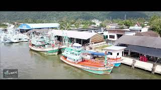 Nice Thailand - beautiful Khanom. Fishing port, sailing yacht and two lovely resorts.