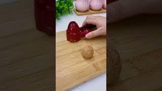 A useful gadget used for cracking sunflower seeds and walnuts etc.Eaay kitchen gadget.
