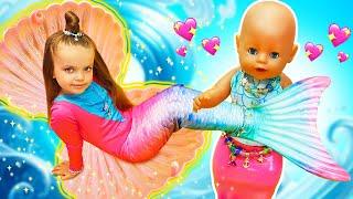 Maya and the baby doll pretend to play mermaids. Family fun stories for kids. Baby dolls videos.