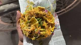 Hardworking old man selling jalebi fafada  At Jaipur street