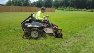 Exmark Lazer Z in action! Eats grass for lunch!