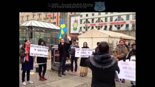 Manifestation mot religiöst våld och förstörelsen av buddhistiska hem och tempel