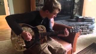 Ben Windheim on resonator with brass slide and pick