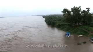 Crossing the mighty Brahmaputra in monsoon spate