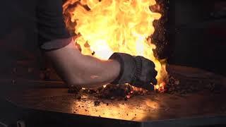 Blacksmith Artist Marcus Mars forging in slow motion.