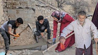 Mohammad demolishes a chicken coop to build a toilet for his grandfather