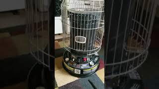 Manual lighting a kerosene heater