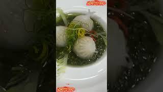 Chicken Jelopini dumplings with green pepper sauce on top is clear and accessible to all audiences