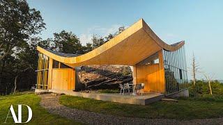 Inside a Family Home Built Around a 12,000-Year-Old Boulder | Unique Spaces | Architectural Digest