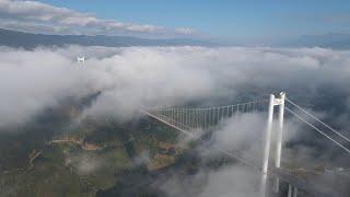 看腾云驾雾的龙江大桥，看高黎贡山天堑变通途Look at the Longjiang Bridge flying through the clouds, and see the natural moa