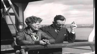 Amelia Earhart Putnam and Fred Noonan return to U.S. aboard SS Malolo, after take...HD Stock Footage