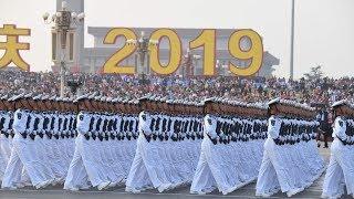 China marks the 70th anniversary of its founding with military parade - watch live