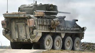 US Army soldiers and ICV-D Stryker armored vehicles with a 30mm cannon during an exercise in Germany