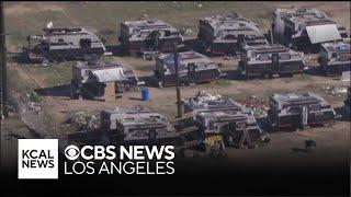 LA County deputies clear homeless residents from RV storage lot taken over by squatters