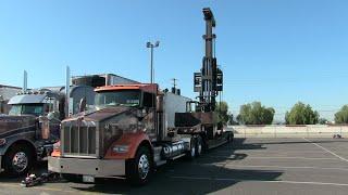 Dunkel Brothers Machinery Moving's 140,000-Pound Capacity 100/140 Versa-Lift Raising the Mast