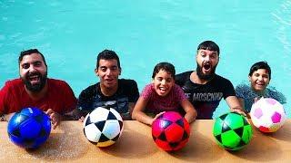 he plays with balloons in the pool